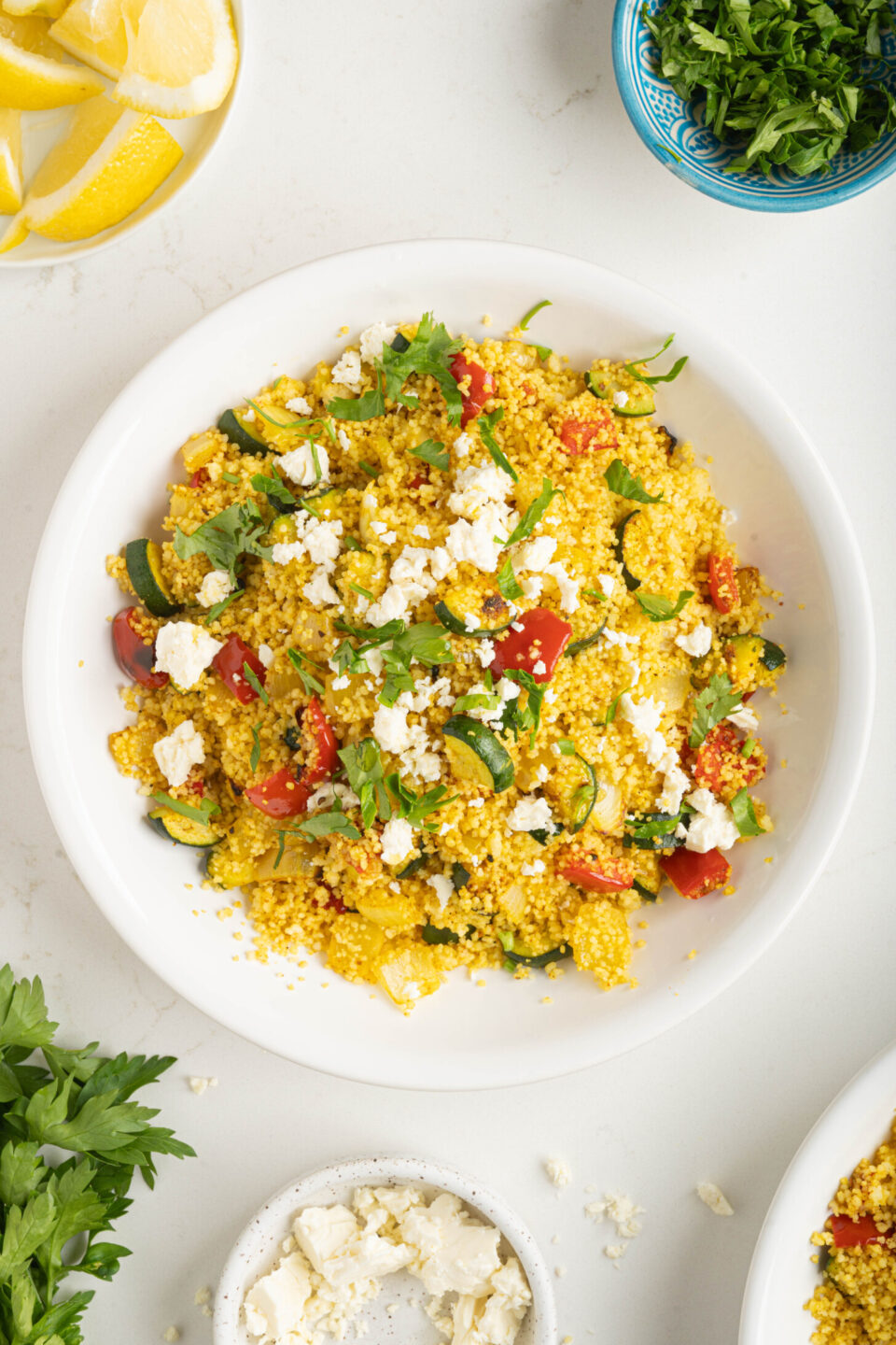 a bowl of warm couscous salad