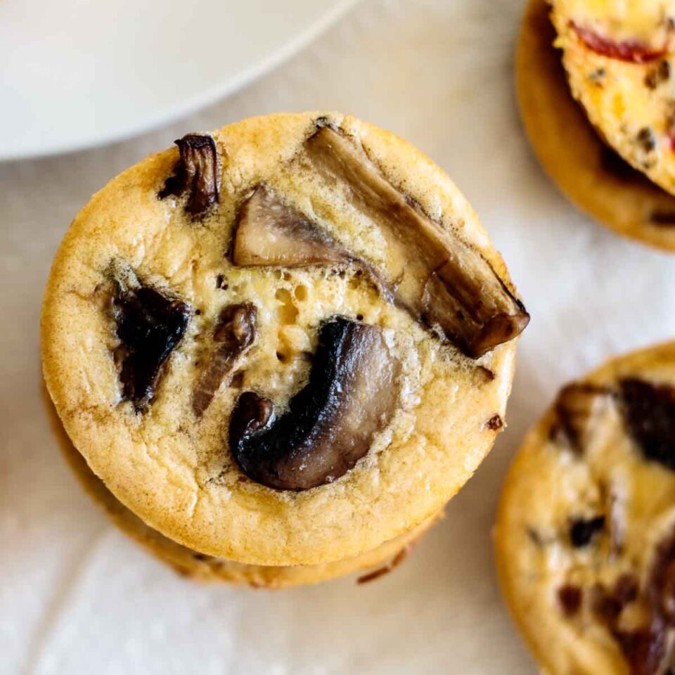 close up on mushroom and onions egg muffin cup, showing its top