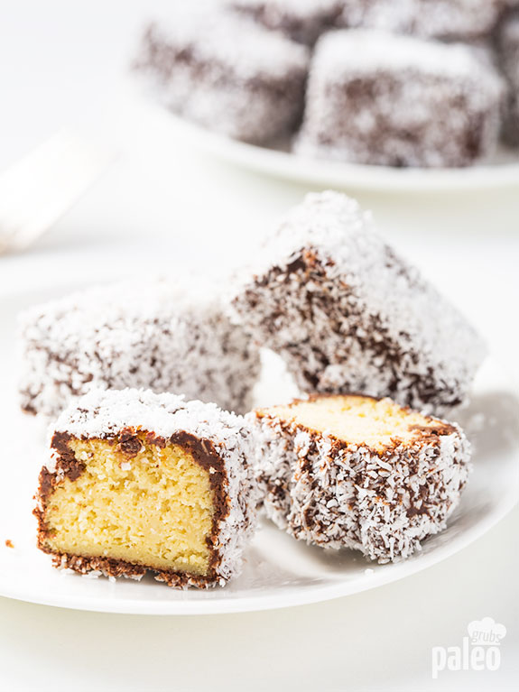 Lamingtons are sweet little cake-bites rolled in coconut flakes and I love them! If you have never had one, you need to make these!!!