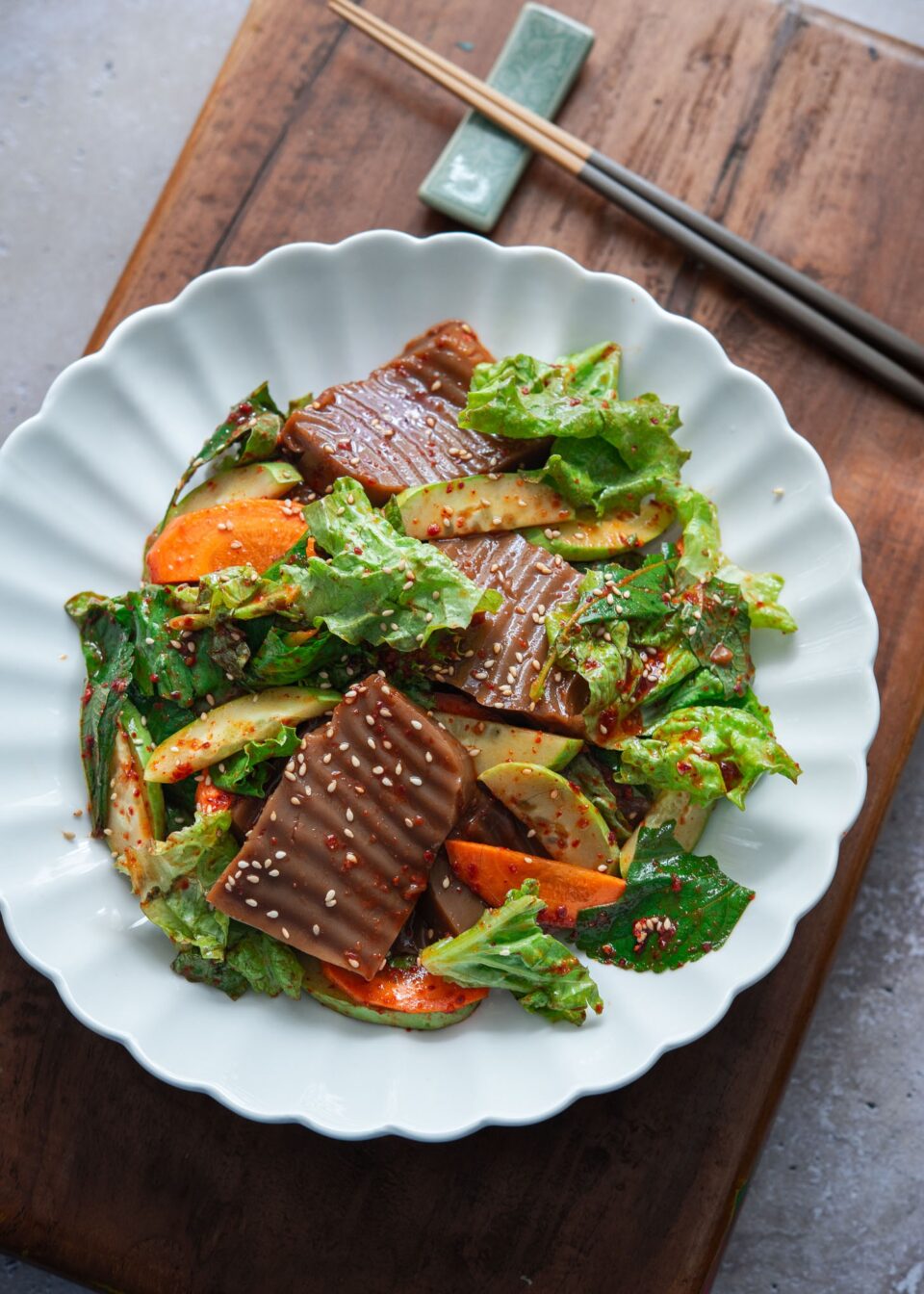 Acorn jelly salad (dotori muk) in a bowl.