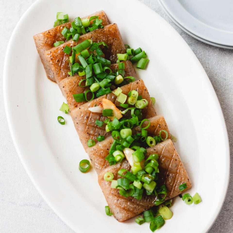 Konnyaku steak served on a plate.