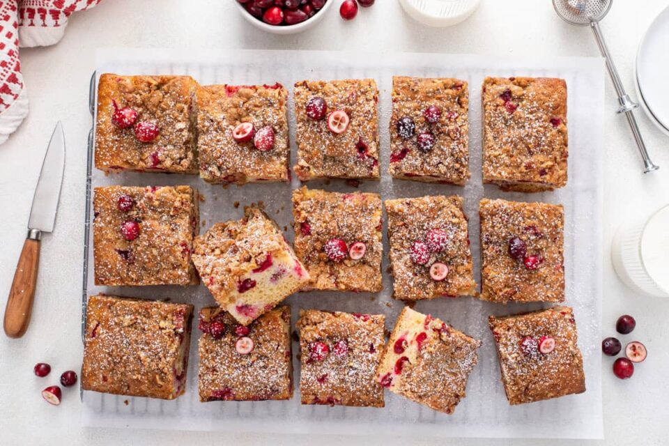 Overhead view of sliced cranberry cake.